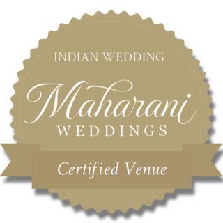 A gold badge displaying "Maharani Weddings" with the text "Indian Wedding" and "Certified Venue," highlighting a wedding venue's prestige.