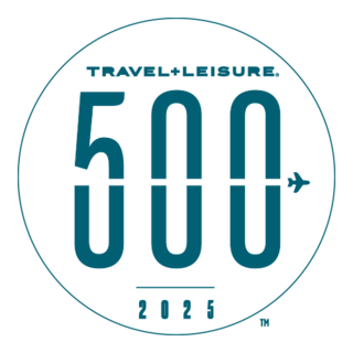 Logo featuring "TRAVEL+LEISURE" along with "500" and "2025" in a circular design, includes an airplane icon.