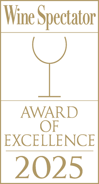 A prestigious award logo featuring a wine glass, indicating the "Wine Spectator Award of Excellence" for 2025.